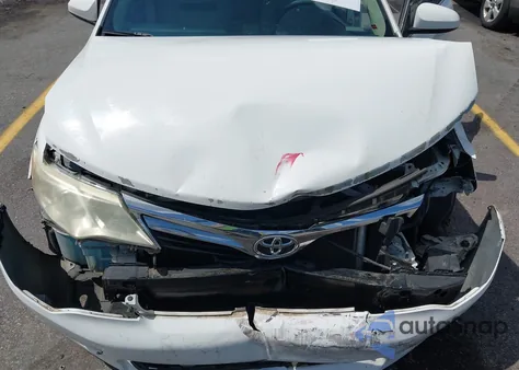 2014 Toyota Camry Le z USA, uszkodzony, nr VIN 4T4BF1FKXER415883